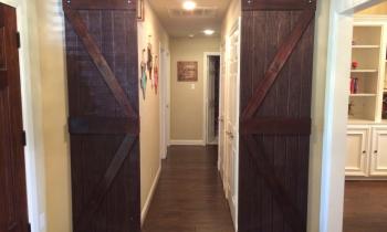 These beautiful barn doors lead you into a Western themed adventure.