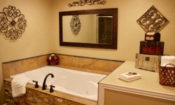 The two-person Jacuzzi is a great place to sit and unwind!